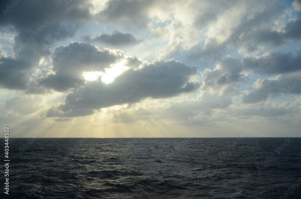 Naklejka premium Clouds over the ocean