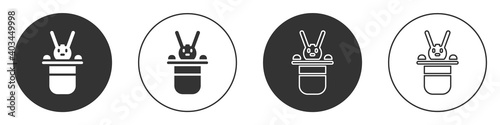 Black Magician hat and rabbit icon isolated on white background. Magic trick. Mystery entertainment concept. Circle button. Vector.