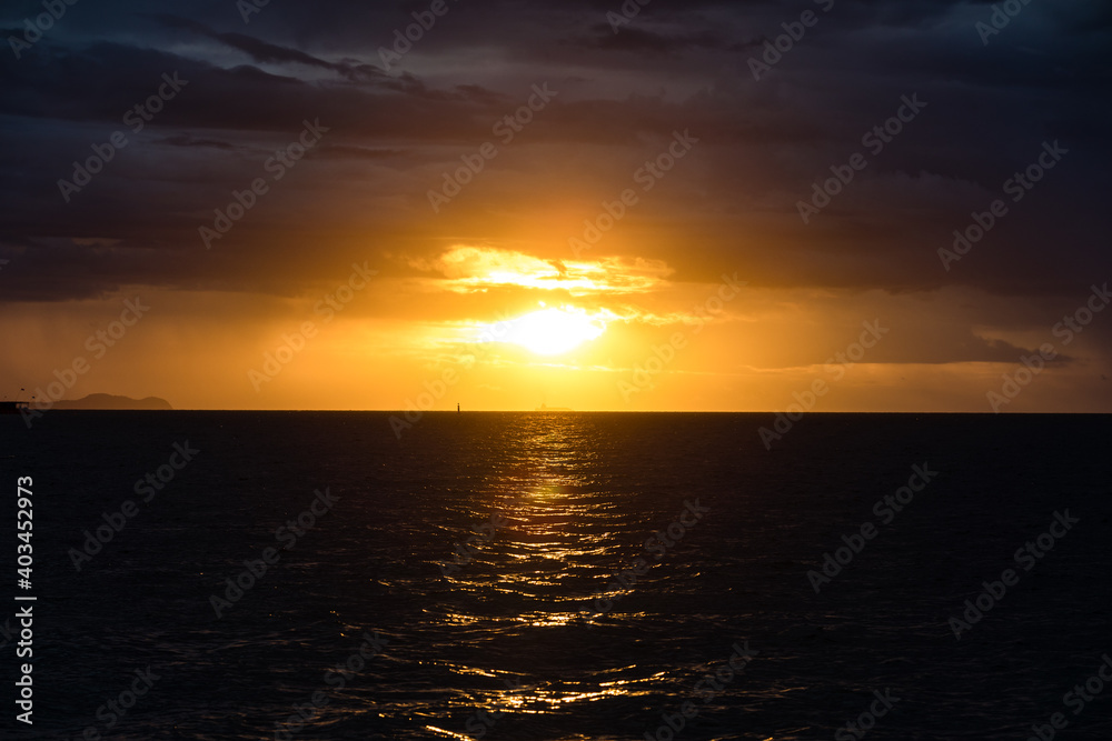 Beautiful dark sky sunset over the sea, dramatic Beautiful dark sky sunset over the sea, dramatic