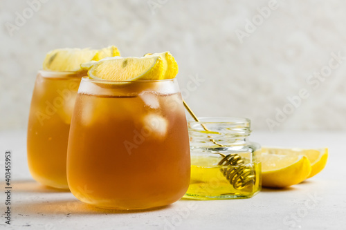 Summer festive drinks, honey lemon iced tea. Space for text.