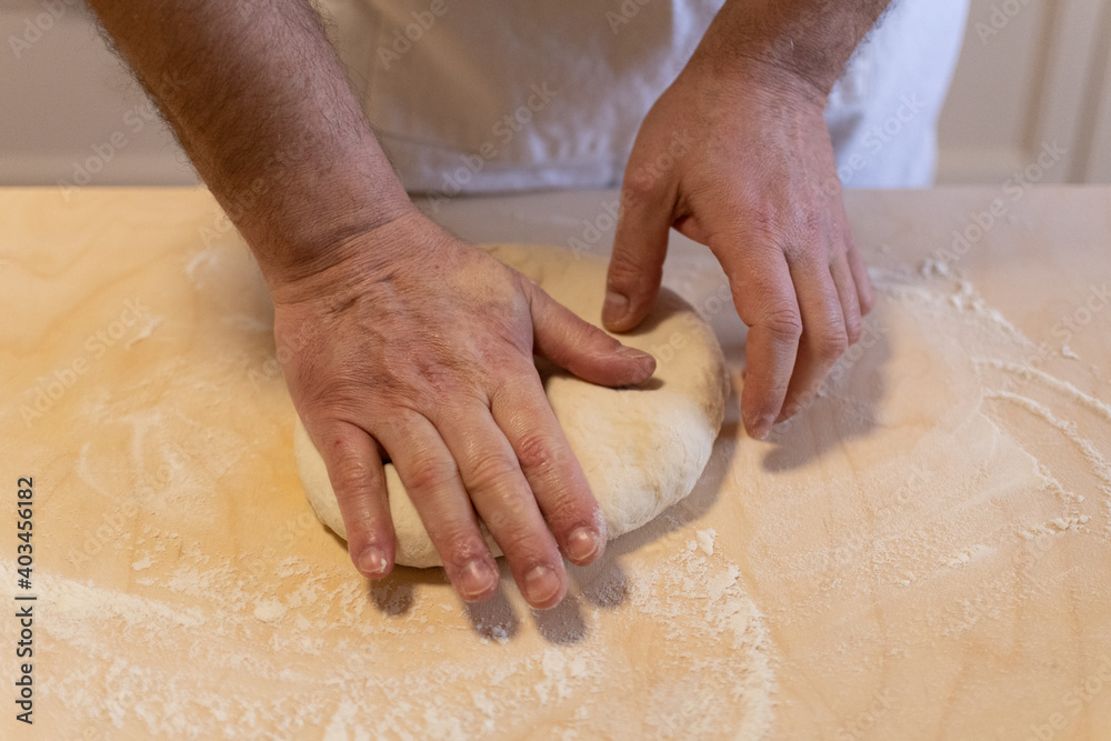 Preparing bread for fried gnocco, one of the best food of Italian cuisine Preparing bread for fried gnocco, one of the best food of Italian cuisine