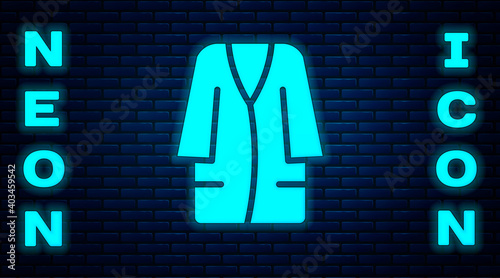Glowing neon Bathrobe icon isolated on brick wall background. Vector.