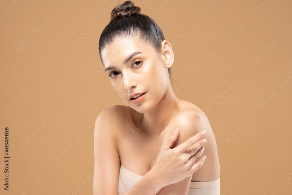 Beautiful Glamour woman touch shoulder smile with clean and fresh skin Happiness and cheerful with positive emotional,isolated on Beige background,Beauty Cosmetics and spa Facial treatment Concept Beautiful Glamour woman touch shoulder smile with clean and fresh skin Happiness and cheerful with positive emotional,isolated on Beige background,Beauty Cosmetics and spa Facial treatment Concept