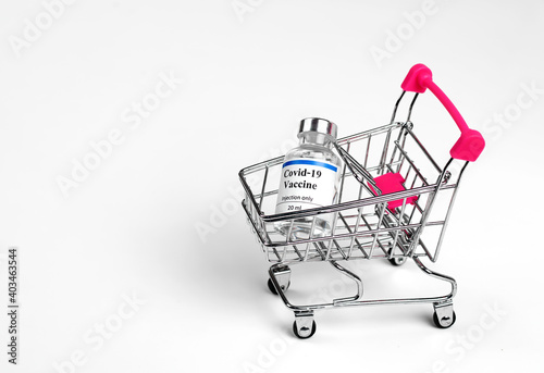 drug purchase concept. Vaccine in supermarket trolley on white background.