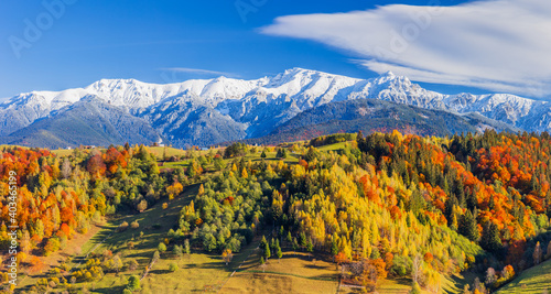 Autumn in Moeciu Village. Panorama of the rural landscape in the Carpathians, Romania.