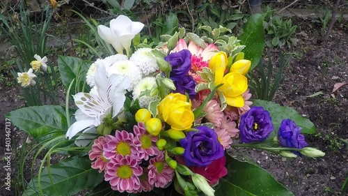 Bouquet of different flower rotating in hand
