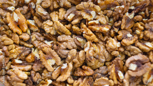 Background of walnuts close up from above healthy food concept