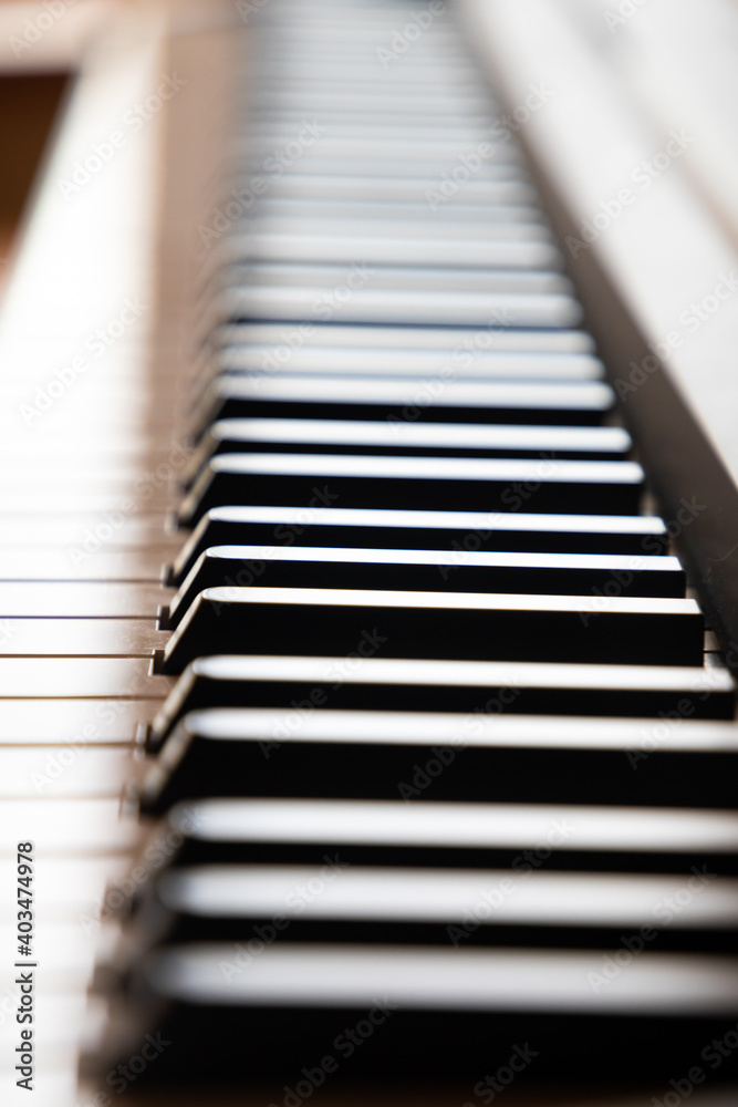 Close up of piano keys at day light, in black and white colors Close up of piano keys at day light, in black and white colors