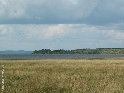 reservoir in the distance beyond the field