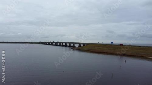 Wallpaper Mural Overhead drone view on the Ketelbrug with the A6 highway. The bridge is located between the Ketelmeer and Ijsselmeer in Flevoland, The Netherlands
 Torontodigital.ca