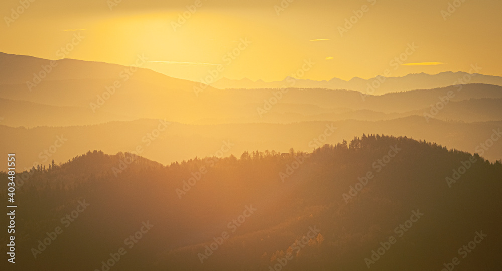 Sunlit layers of hills, early morning