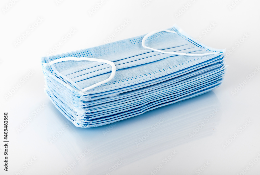 Medical mask on white background. Corona protection pollution, virus, flu and Health care and surgical concept. Medical mask on white background. Corona protection pollution, virus, flu and Health care and surgical concept.
