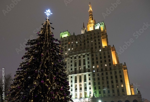 Christmas tree next to the building in Moscow