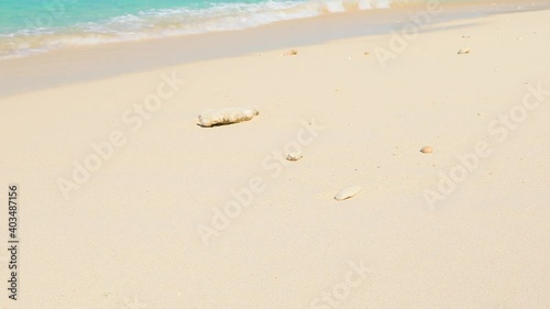 beautiful beach and clear waves in Okinawa Kurima island Nagama beach photo