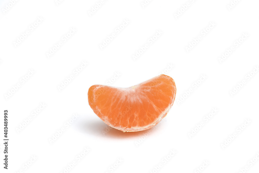 Slice of tangerine on a white background