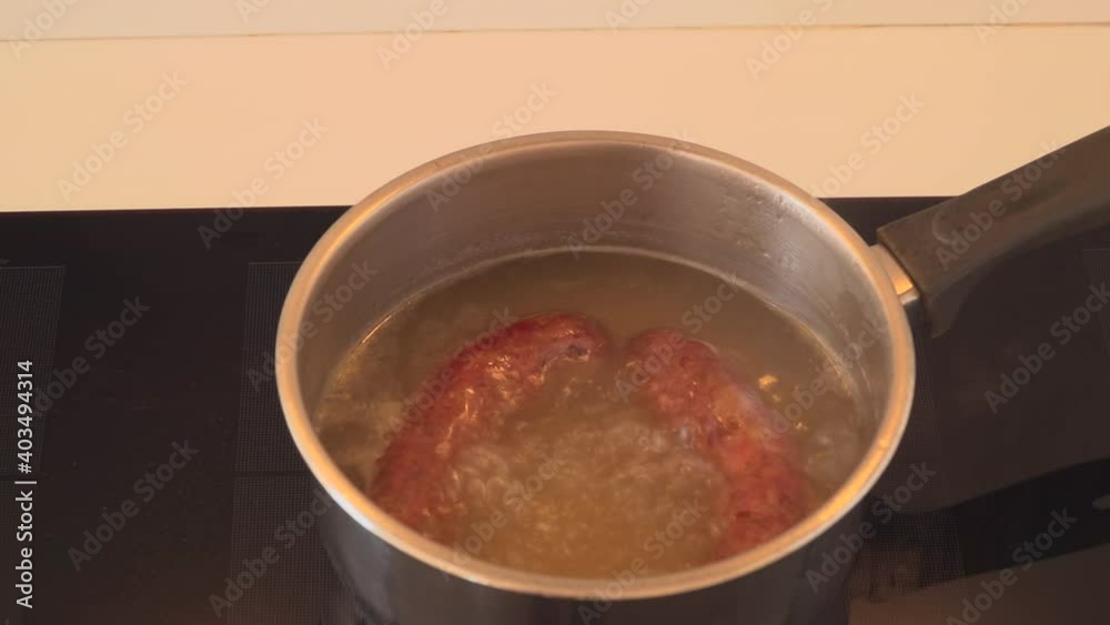 Fresh Sausages cooked in boiling water Fresh Sausages cooked in boiling water