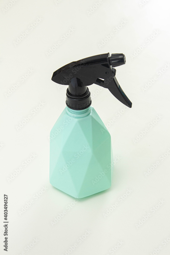 baby blue spray bottle on white background baby blue spray bottle on white background
