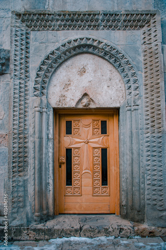 old door in a church © vardan