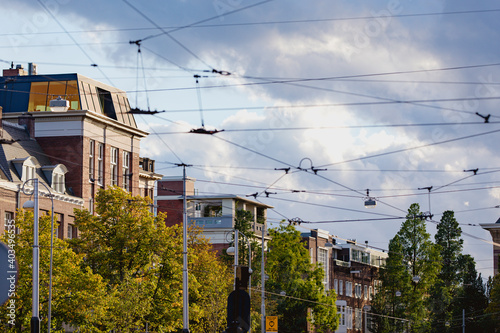  Tram cables in Amsterdam, electricity detail, public transport in Europe