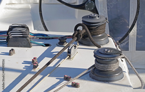 metallic pulley block and ropes on the deck © AVD