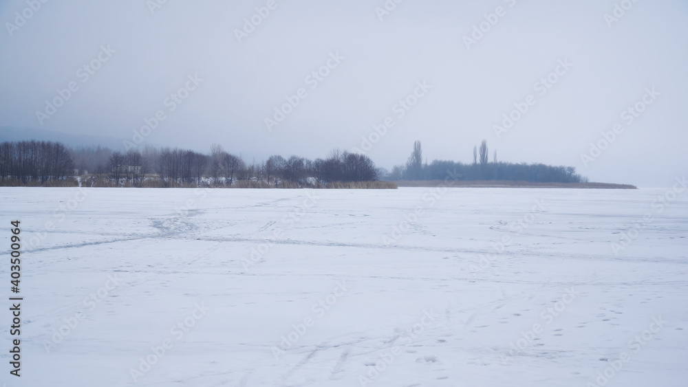 Frozen surface of the Voronezh reservoir in winter Frozen surface of the Voronezh reservoir in winter