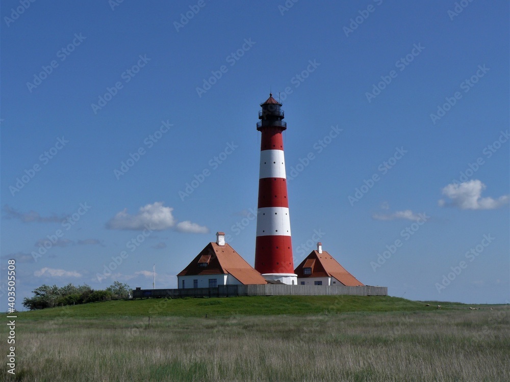 Leuchtturm Westerheversand mit alten Wärterhäusern und Landschaften bei Westerhever Leuchtturm Westerheversand mit alten Wärterhäusern und Landschaften bei Westerhever