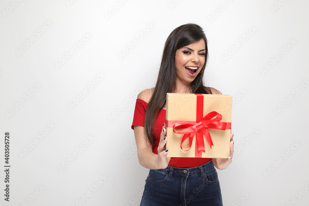 beautiful girl holding valentine's gift on white background beautiful girl holding valentine's gift on white background