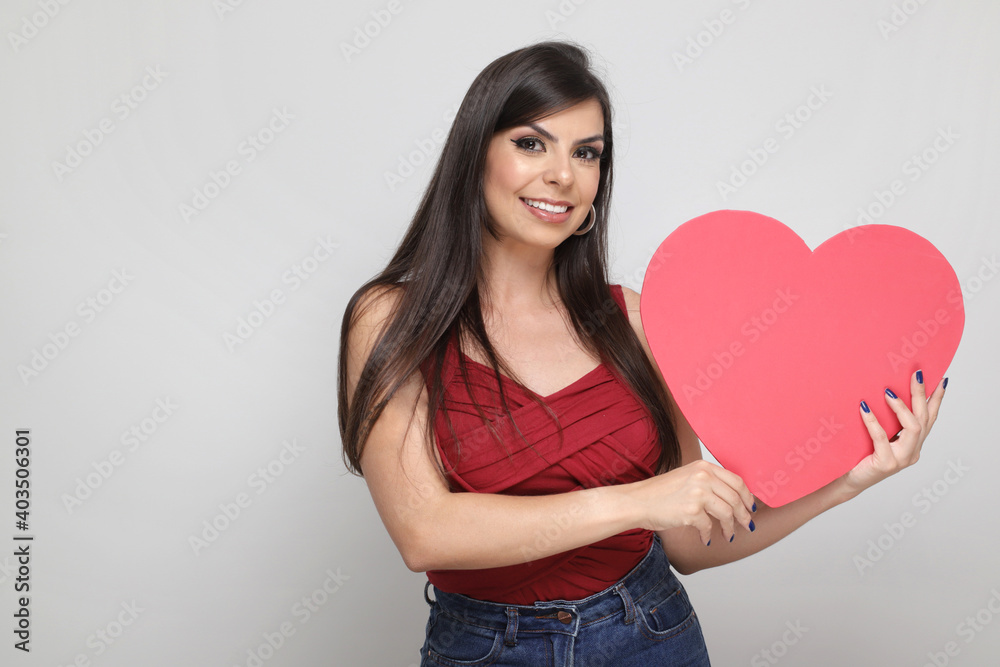 beautiful girl holding valentine's gift on white background beautiful girl holding valentine's gift on white background