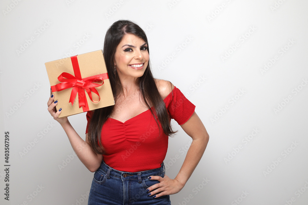beautiful girl holding valentine's gift on white background beautiful girl holding valentine's gift on white background