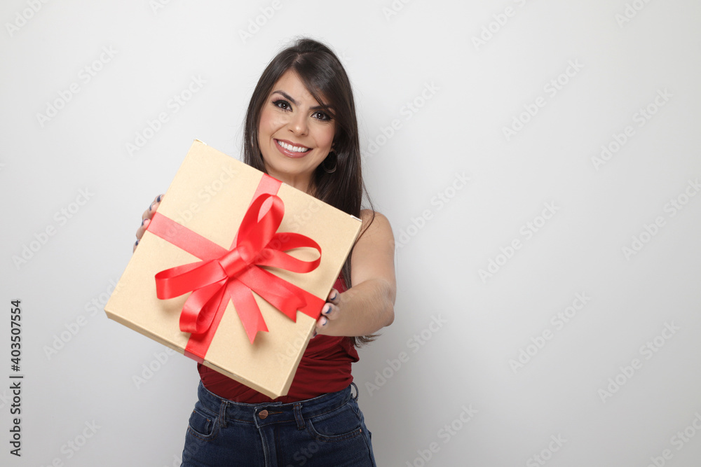 beautiful girl holding valentine's gift on white background beautiful girl holding valentine's gift on white background
