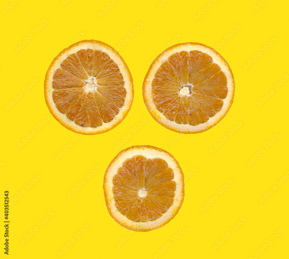 Orange slice isolated on yellow background. Orange slice isolated on yellow background.