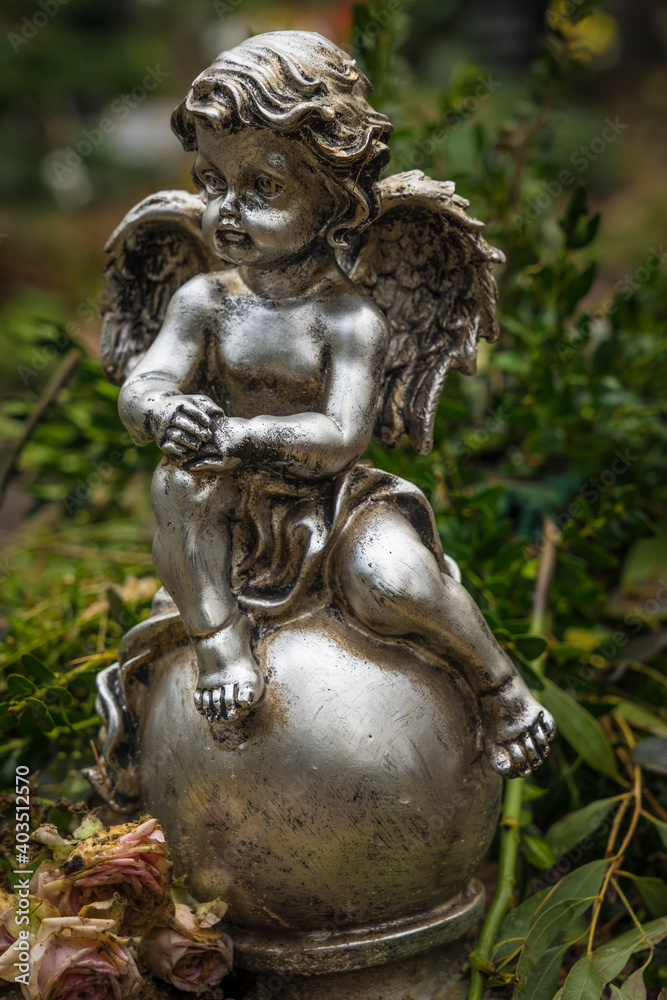 angel statue on an old grave