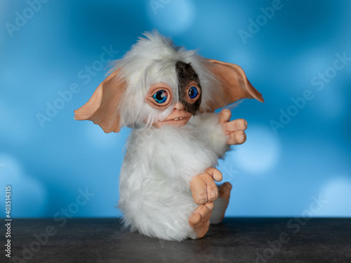Photography toy Gremlin Gizmo, hand made in a mixed technique from faux fur and polymer clay
