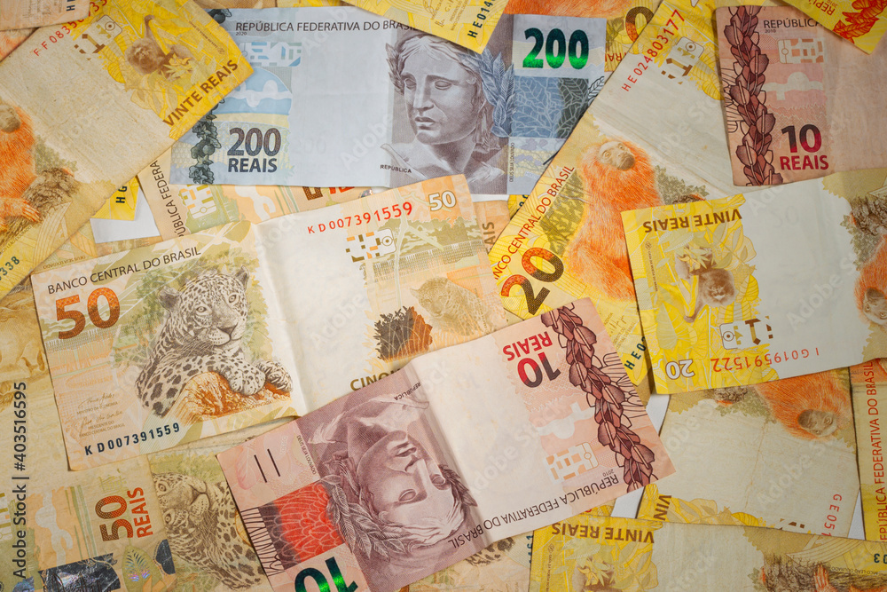 Brazilian money bill.  Two hundred bill, ten, twenty, and fifty real bill. Top view