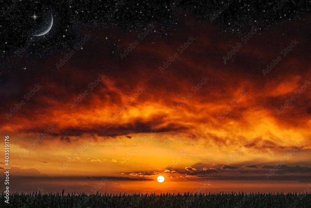young month in the sky, red sunset background