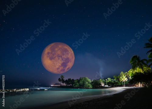 Full moonset and moonrise in Hawaii