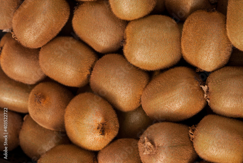 Pile of raw kiwi fruit view from above