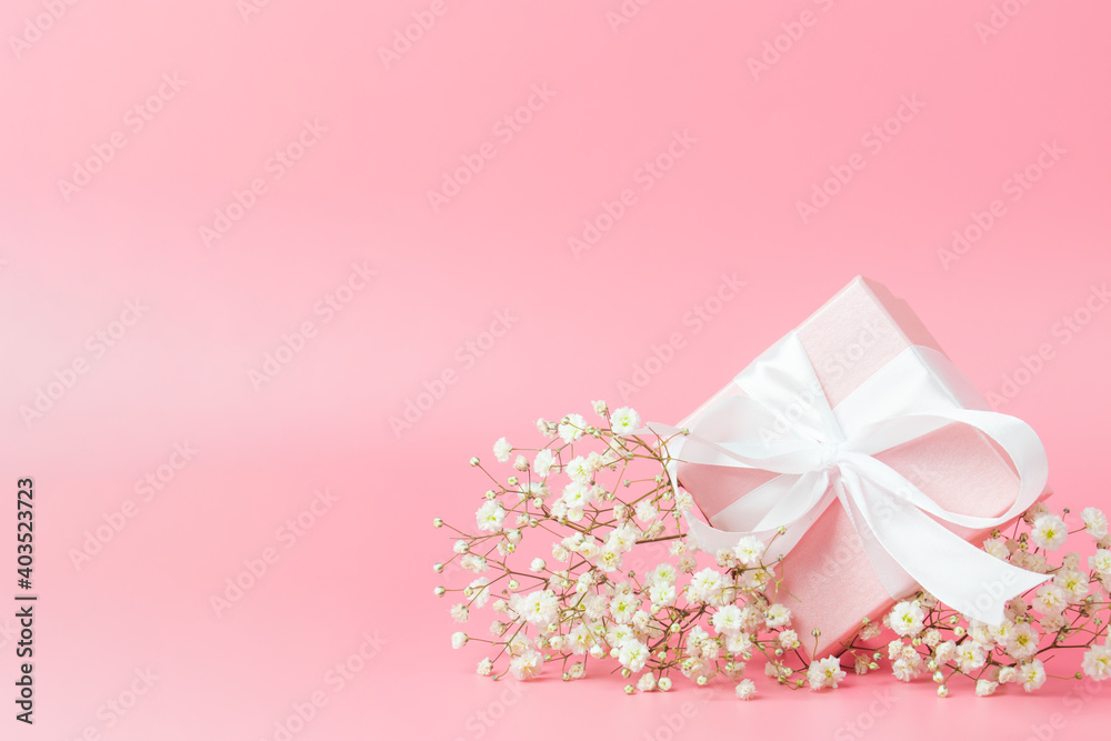 Gift box on pink background. There is room for text. Gift box on pink background. There is room for text.