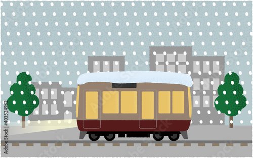 吹雪の中、ライトを点けて都市を走る電車のベクターイラスト
