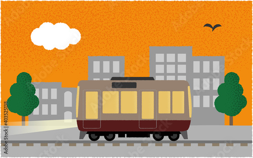 夕方、ライトを点けて都市を走る電車のベクターイラスト