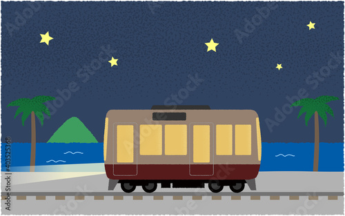 夜、ライトを点けて海沿いを走る電車のベクターイラスト