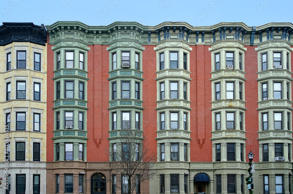 Row of old fashioned ornate 19th century apartment buildings