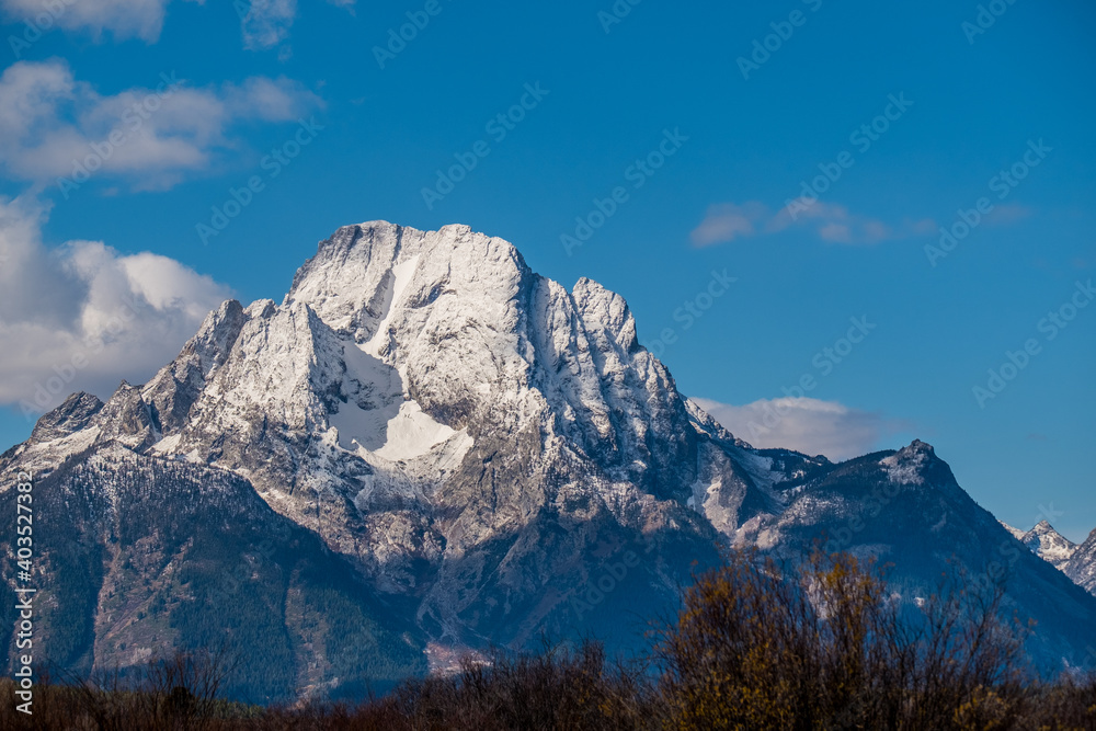 Snow Capped Mountain Top with Blue Skies