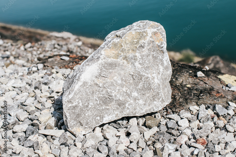 Big granite rock stone on. Natural stone. Grey, black and white granite texture, granite surface and background. Material for decoration texture, interior design Big granite rock stone on. Natural stone. Grey, black and white granite texture, granite surface and background. Material for decoration texture, interior design
