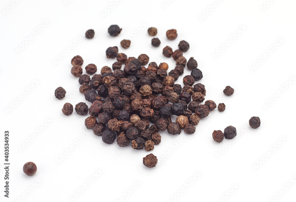 Black pepper on a white background Black pepper on a white background