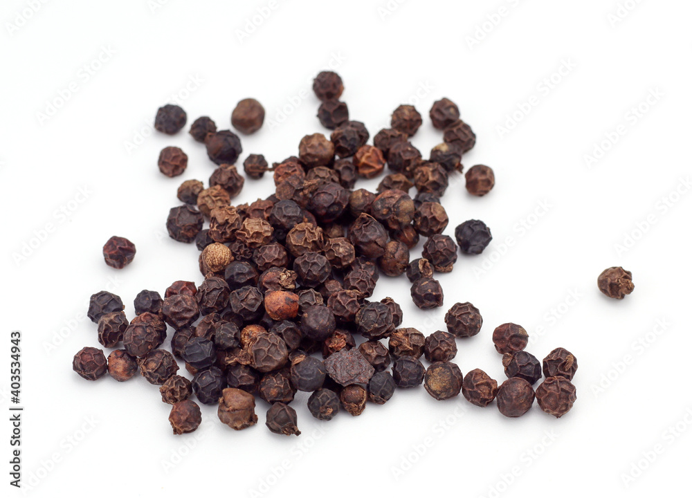 Black pepper on a white background Black pepper on a white background