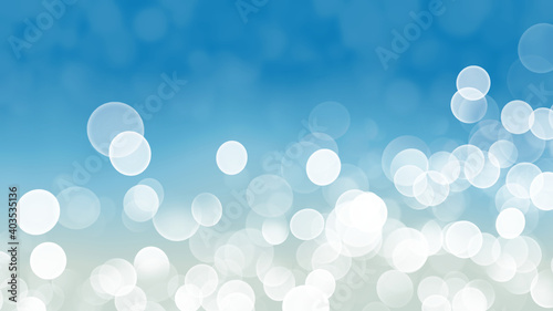 白色の玉ぼけと青色と白色のグラデーションの抽象的な背景イメージ素材