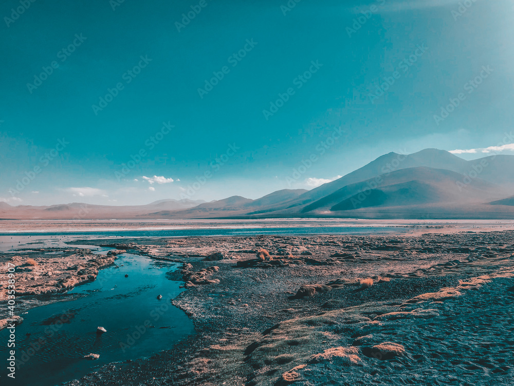 Stunning panoramic view of famous wild Siloli Desert. Beautiful landscape of spectacular Bolivian Andes and the Altiplano along the scenic road between Salar de Uyuni and Laguna Colorada, in Bolivia Stunning panoramic view of famous wild Siloli Desert. Beautiful landscape of spectacular Bolivian Andes and the Altiplano along the scenic road between Salar de Uyuni and Laguna Colorada, in Bolivia