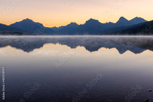 sunrise foggy mountain lake © Joshua