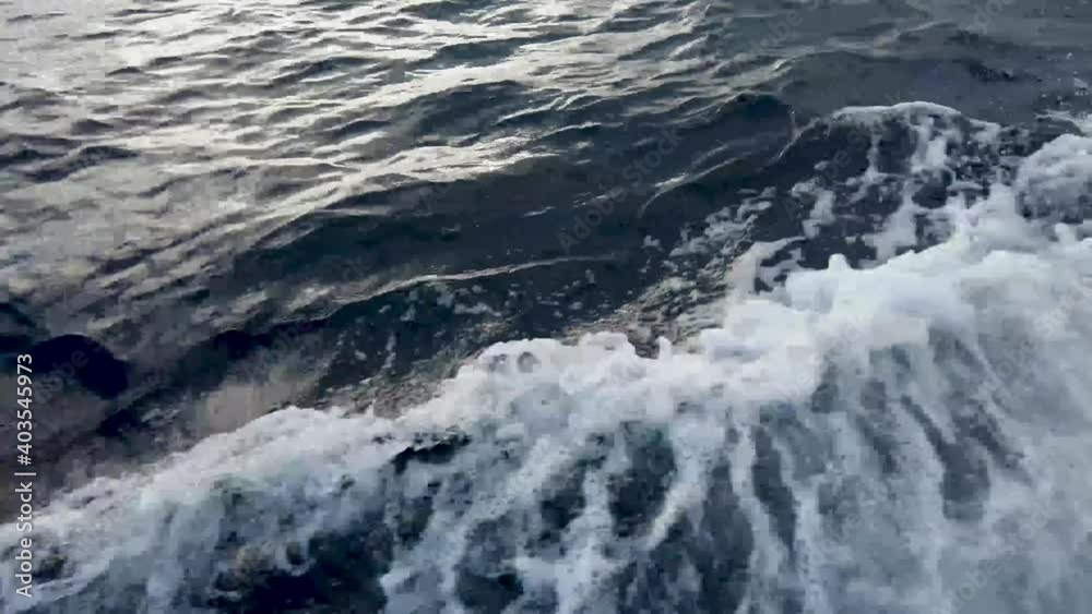 standing on a boat moving waves moving down to up horizon standing on a boat moving waves moving down to up horizon